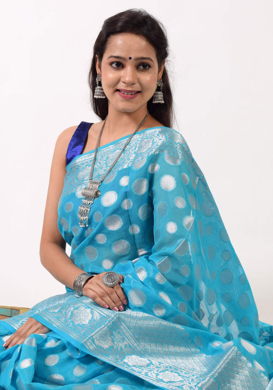 Turquoise Blue Banarasi Semi Georgette Soft Silk Silver Zari Woven Broad Floral