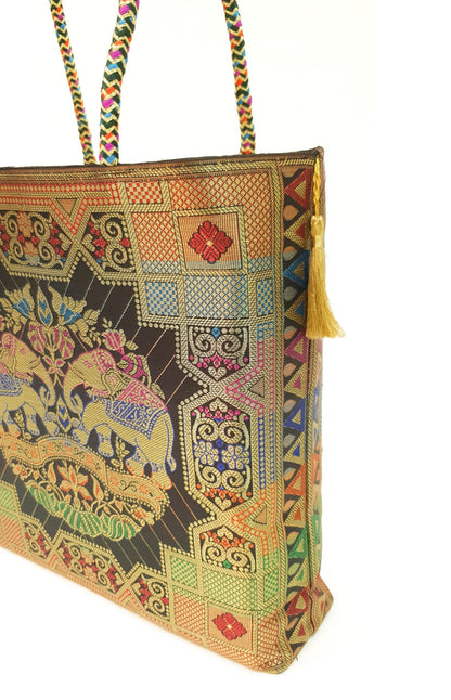 Black Party Wear Hand Bag Banarasi Zari Brocade Golden Tassels In Elephant Motif
