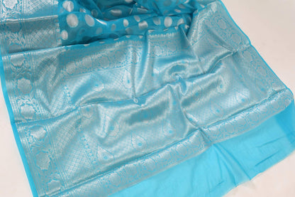 Turquoise Blue Banarasi Semi Georgette Soft Silk Silver Zari Woven Broad Floral